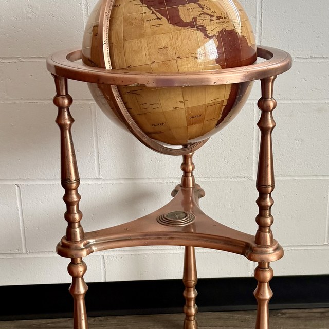 World globe on wooden stand